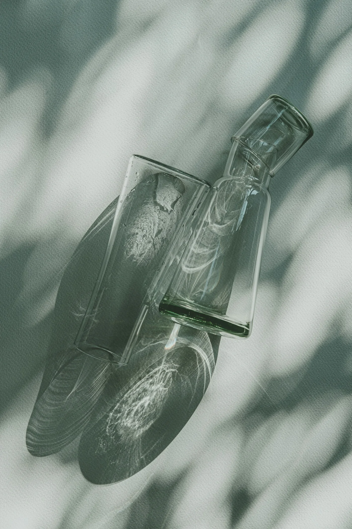 Glass skincare bottle in morning light